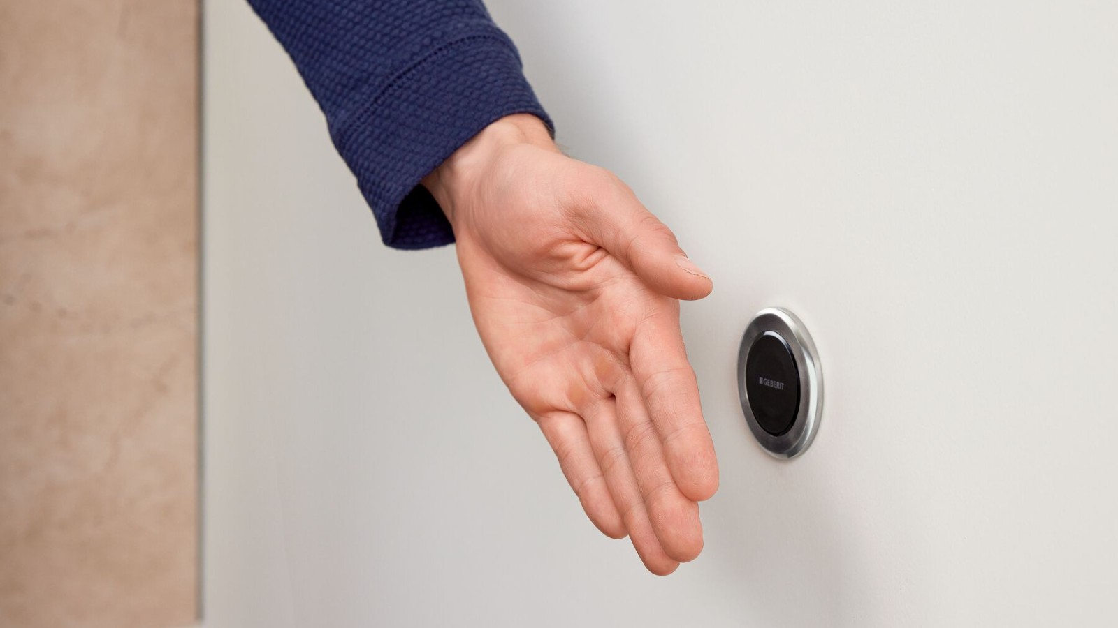 Commande à distance sans contact Geberit Type10, ronde, avec main Commande à distance sans contact Geberit Type10, ronde, avec main