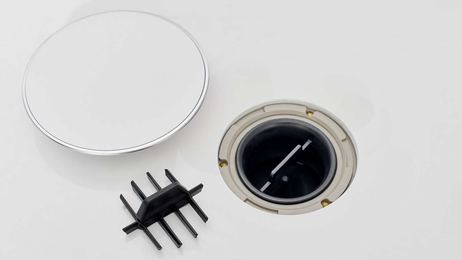 Tappo per piletta e inserto a pettine Tappo per piletta e inserto a pettine