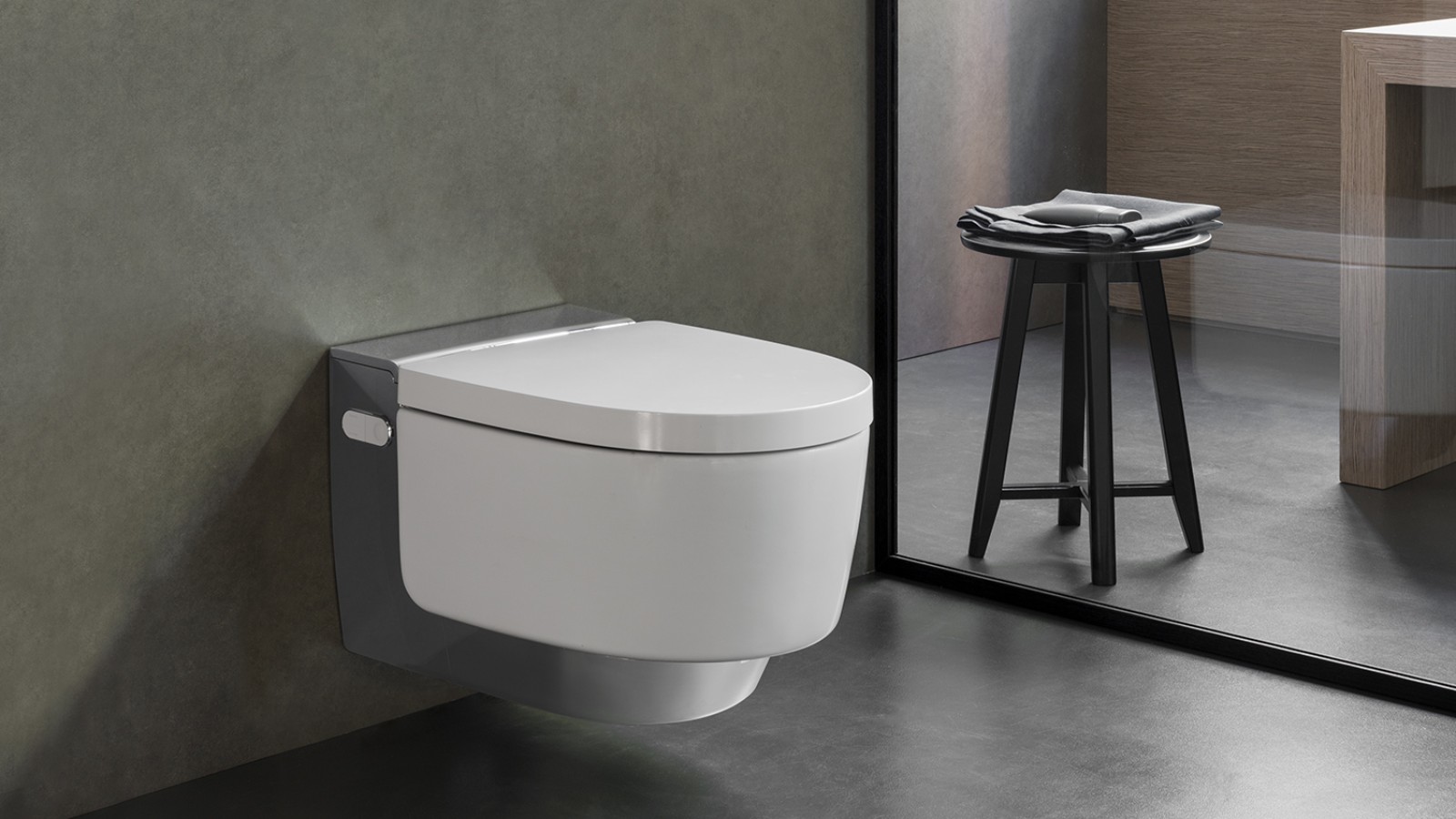 Das AquaClean Mera bettet sich aufgrund seines Designs harmonisch in die Badlandschaft ein Das AquaClean Mera bettet sich aufgrund seines Designs harmonisch in die Badlandschaft ein
