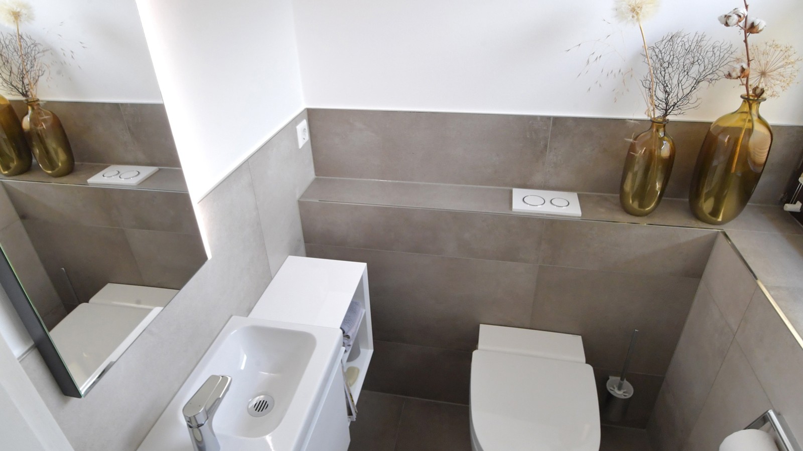 La salle de bains d’invités après la rénovation La salle de bains d’invités après la rénovation