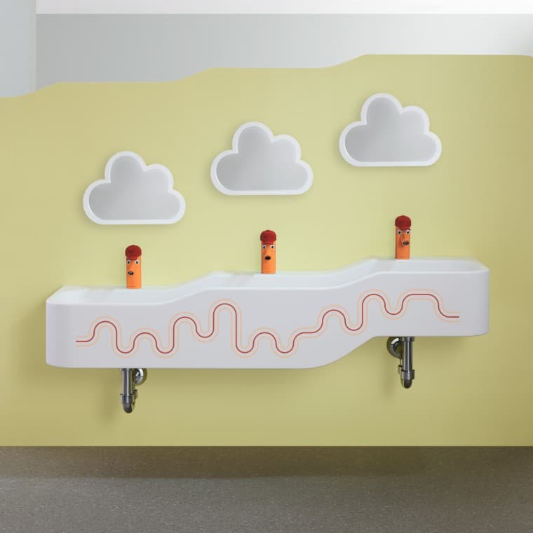 Espace sanitaire Geberit Bambini en rouge carmin et orange Espace sanitaire Geberit Bambini en rouge carmin et orange