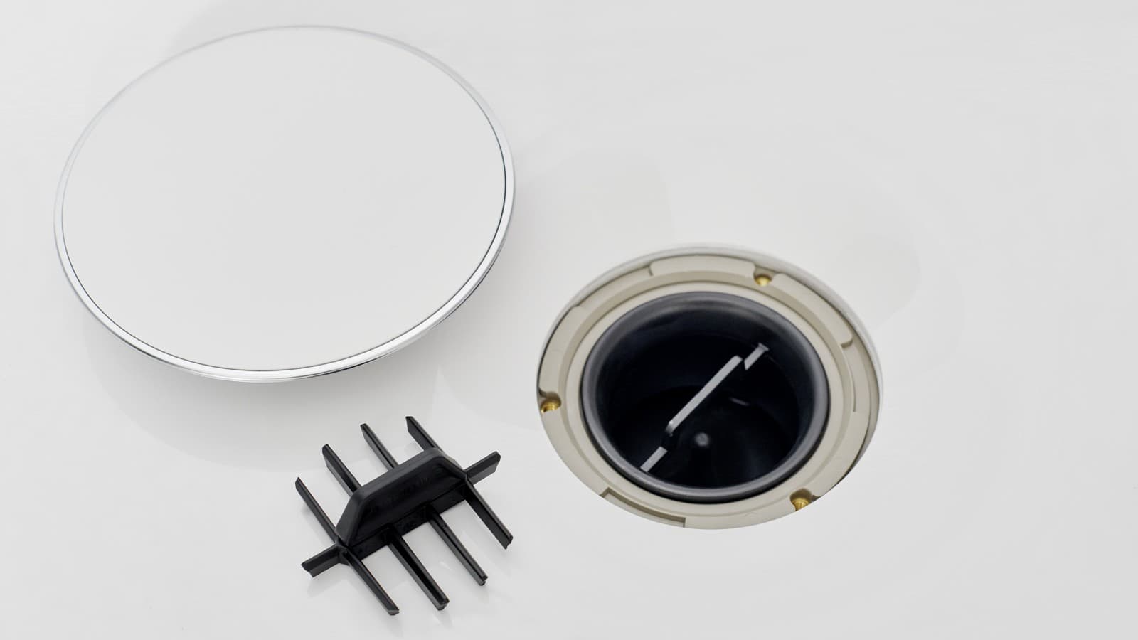 Tappo per piletta e inserto a pettine Tappo per piletta e inserto a pettine