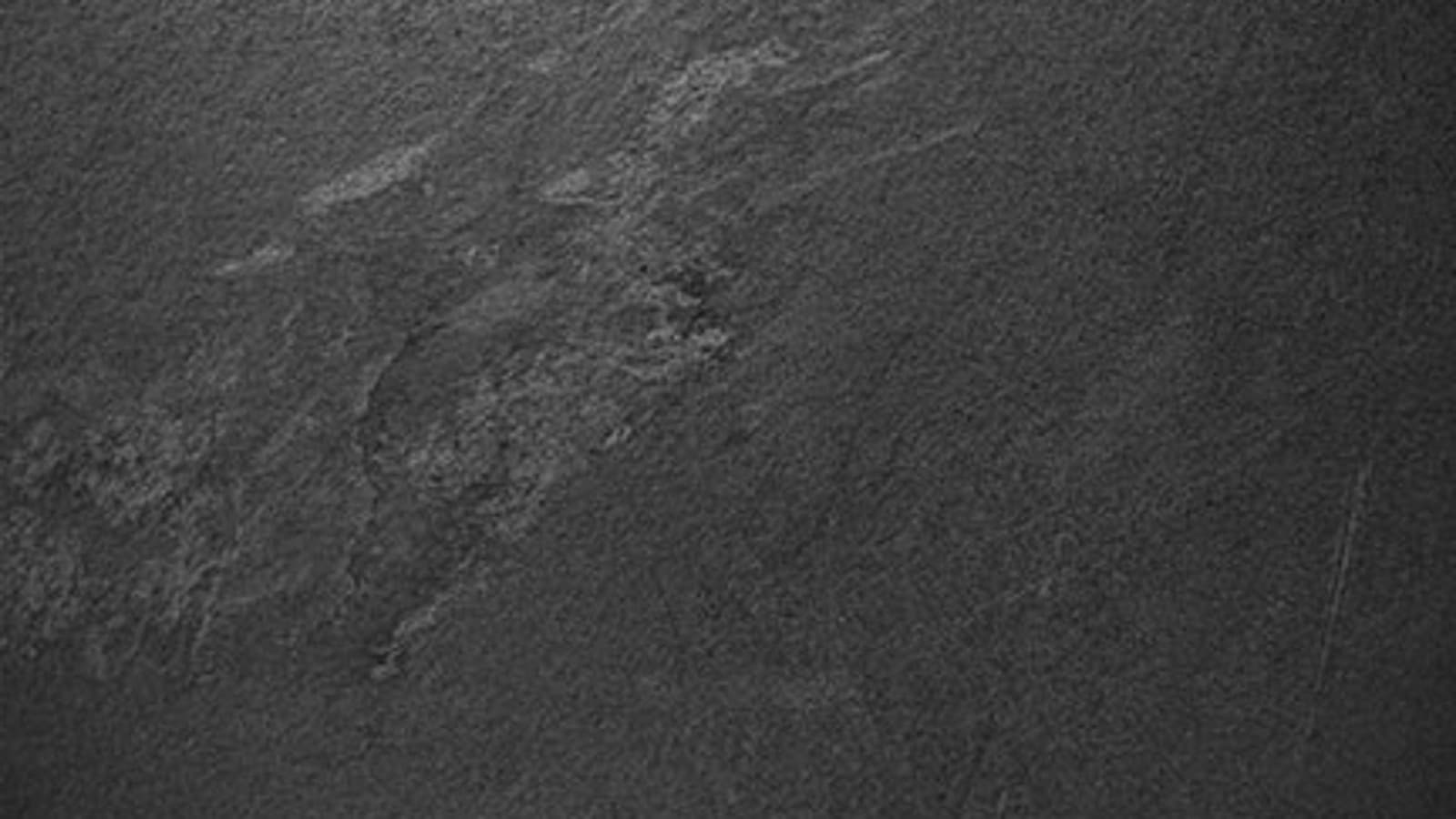 Monolith con rivestimento frontale in grès aspetto ardesia Monolith con rivestimento frontale in grès aspetto ardesia