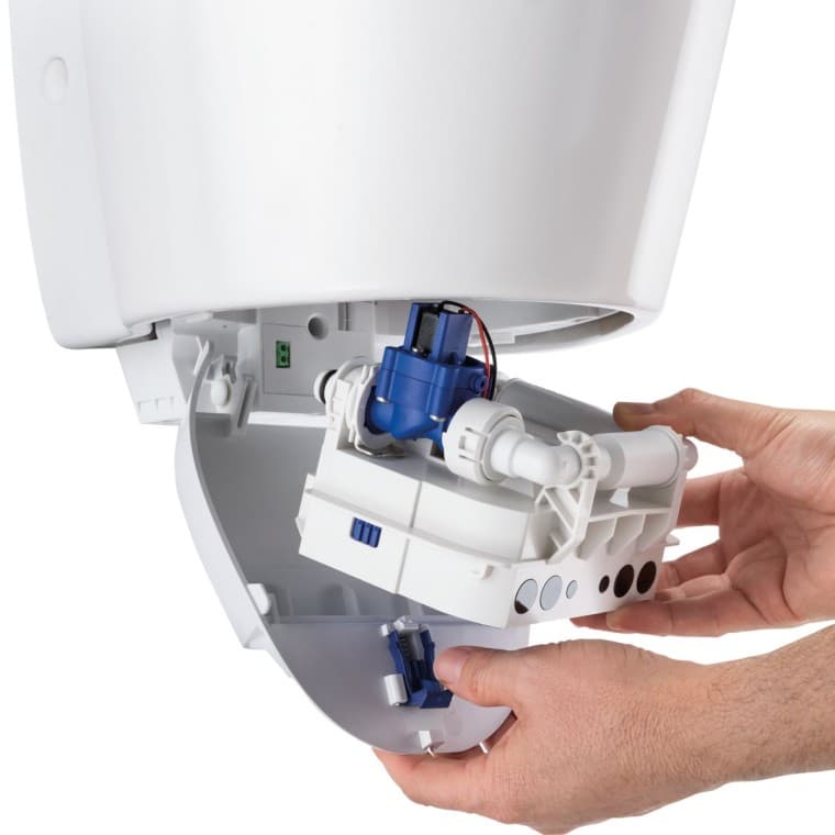 Unité de commande d’urinoir Geberit dans sa station d’accueil Unité de commande d’urinoir Geberit dans sa station d’accueil