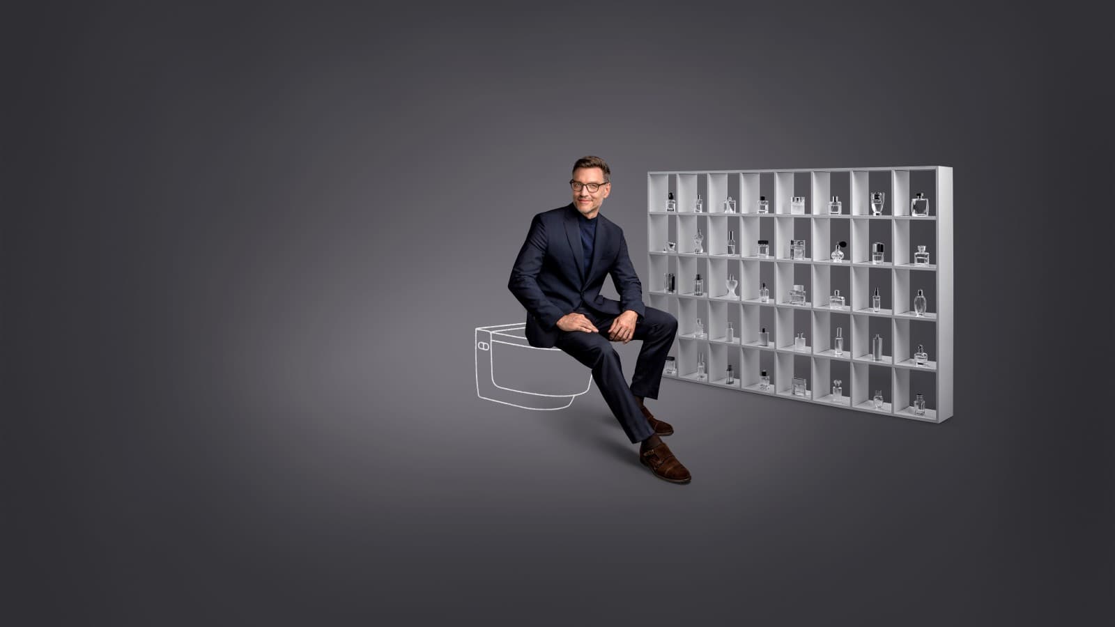 Mick è seduto sul WCdoccetta Geberit AquaClean Mera. Mick è seduto sul WCdoccetta Geberit AquaClean Mera.